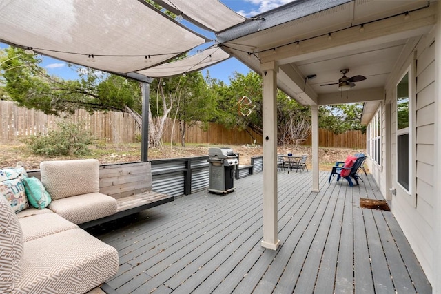 20602 Falcon, Lago Vista, TX 78645 - wooden terrace with grilling area, a ceiling fan, and a fenced backyard
