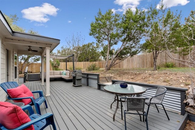 20602 Falcon, Lago Vista, TX 78645 - deck with a fenced backyard, a ceiling fan, grilling area, outdoor dining area, and outdoor lounge area