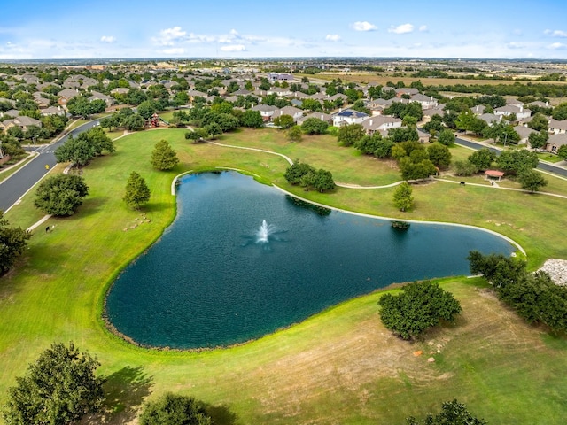 bird's eye view featuring a residential view and a water view