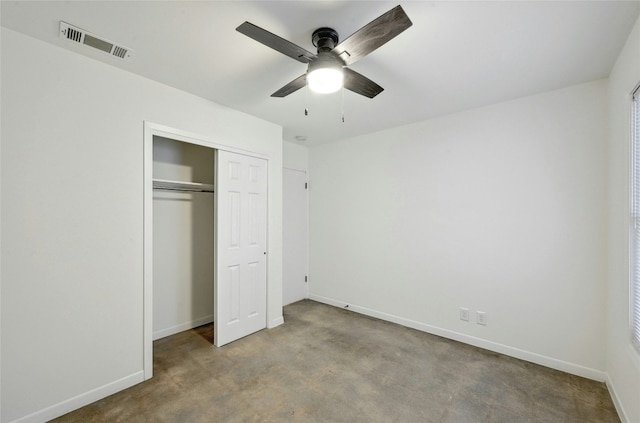 unfurnished bedroom featuring a closet, visible vents, ceiling fan, and baseboards