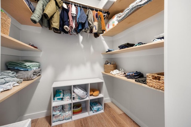 spacious closet with light wood-type flooring