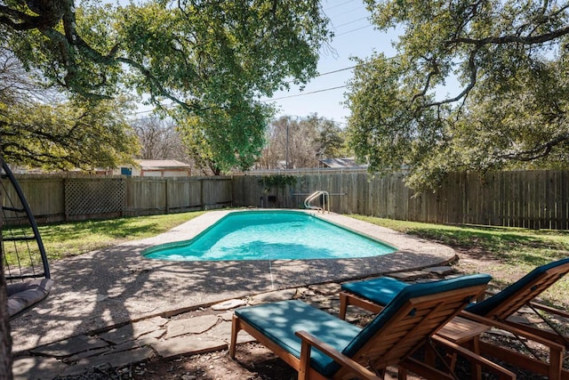 view of pool featuring a patio area, a fenced backyard, and a fenced in pool