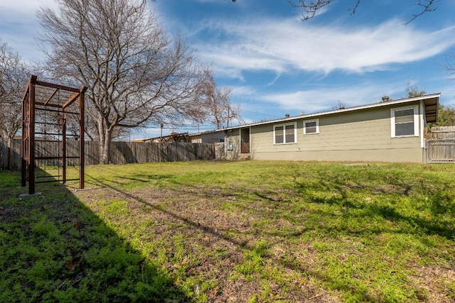 view of yard featuring fence