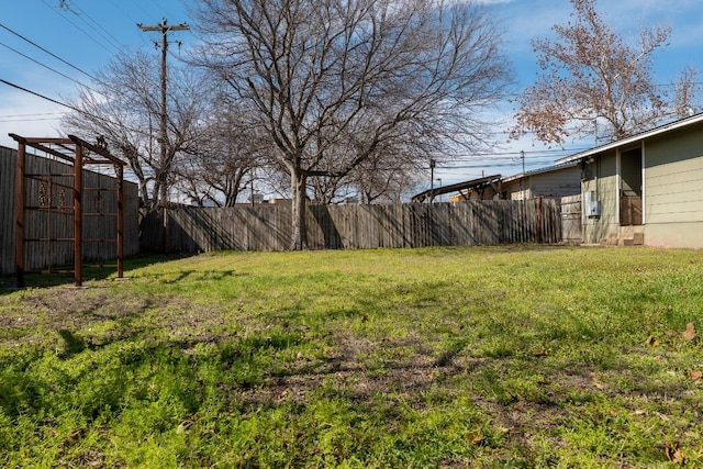 view of yard featuring fence