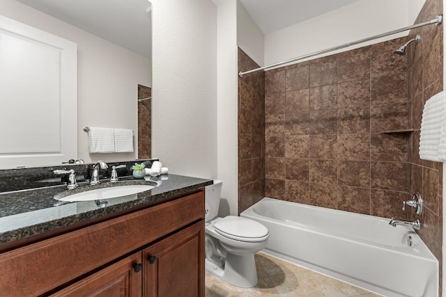 full bathroom featuring  shower combination, vanity, toilet, and tile patterned floors