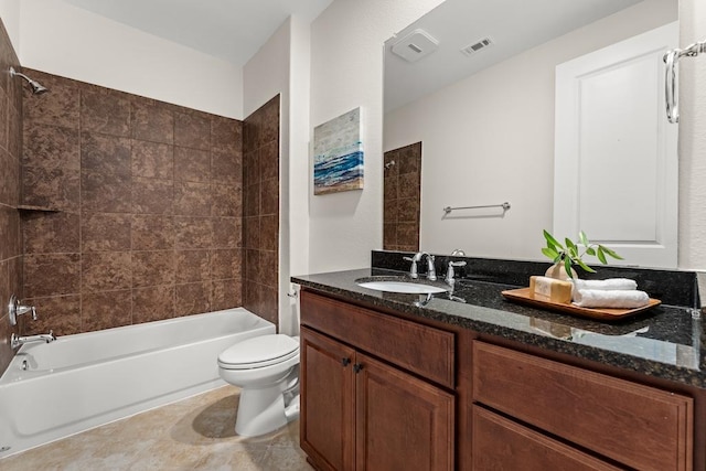 full bathroom featuring toilet, shower / bathtub combination, visible vents, and vanity