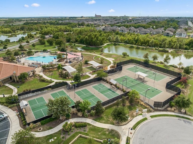 aerial view with a residential view and a water view