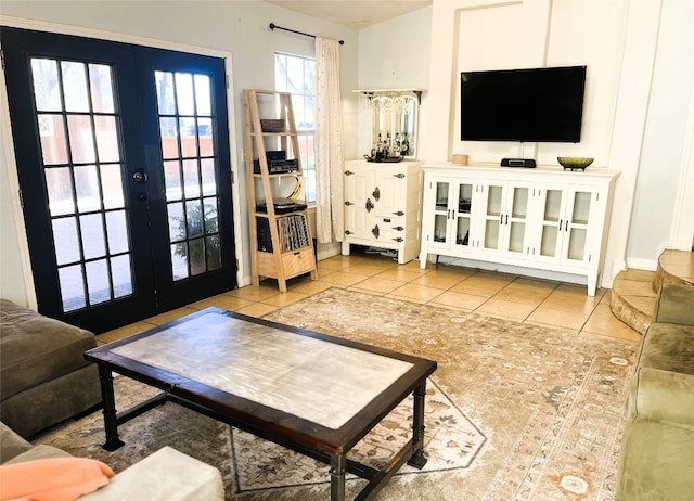 401 San Jacinto St, Smithville, TX 78957 - tiled living room with french doors