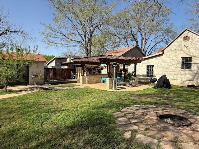 401 San Jacinto St, Smithville, TX 78957 - view of yard featuring a patio, fence, a fire pit, and a pergola