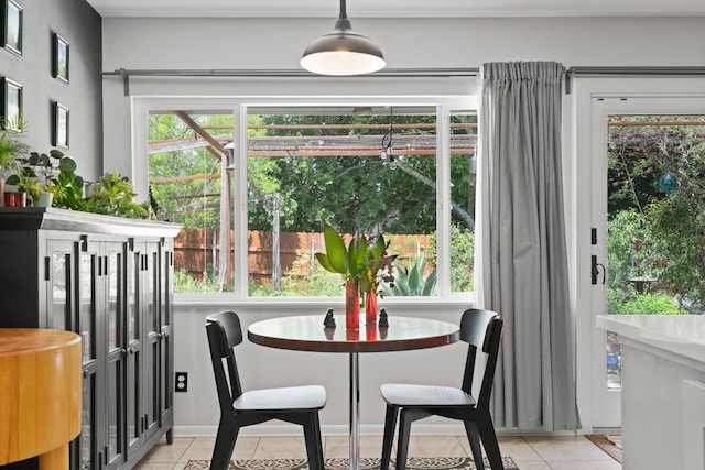 dining space with light tile patterned floors