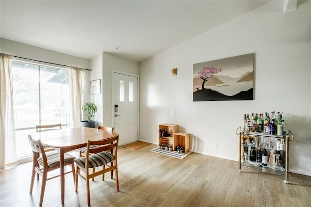 dining space featuring wood finished floors