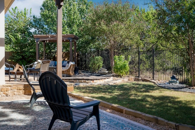 view of yard with a patio area, a fenced backyard, and a pergola