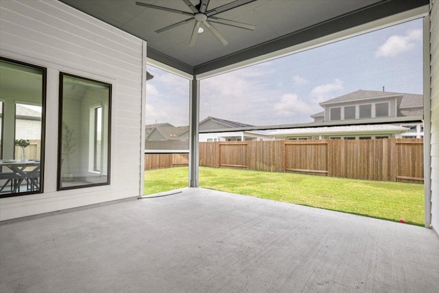 view of patio featuring a fenced backyard and a ceiling fan