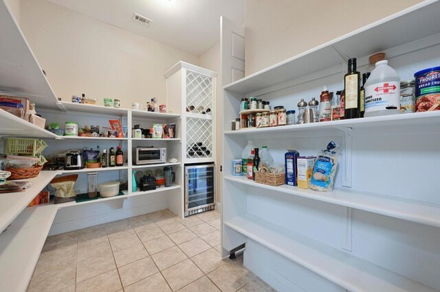 114 Hazelnut Ct, Driftwood, TX 78619 - pantry with wine cooler
