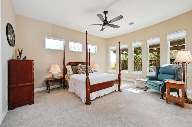 114 Hazelnut Ct, Driftwood, TX 78619 - bedroom featuring baseboards, light colored carpet, and ceiling fan