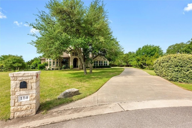 114 Hazelnut Ct, Driftwood, TX 78619 - view of front of house with a front yard