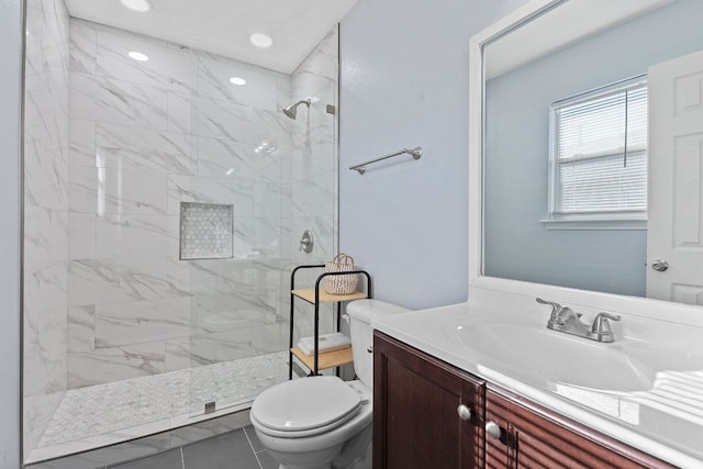bathroom featuring toilet, a walk in shower, vanity, and recessed lighting