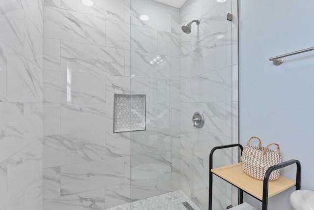 full bathroom featuring a shower stall