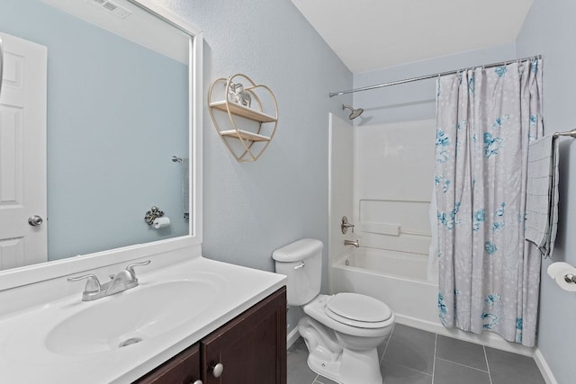 bathroom featuring toilet, vanity, visible vents, tile patterned floors, and shower / bath combination with curtain