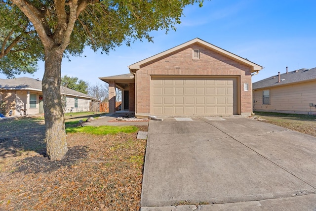 ranch-style house featuring concrete driveway, a garage, and brick siding