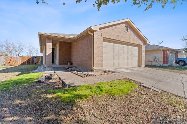 ranch-style house featuring brick siding, driveway, fence, and a garage