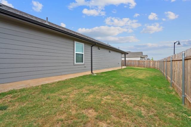 view of yard featuring a fenced backyard