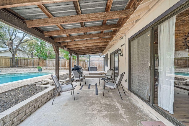 view of patio / terrace with a fenced backyard and a fenced in pool