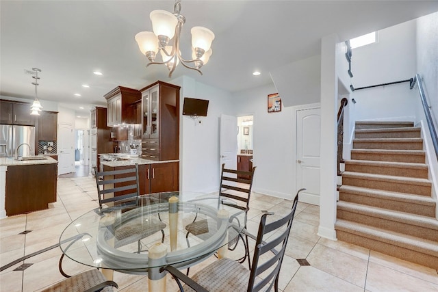 dining area featuring recessed lighting, baseboards, stairway, a notable chandelier, and light tile patterned flooring