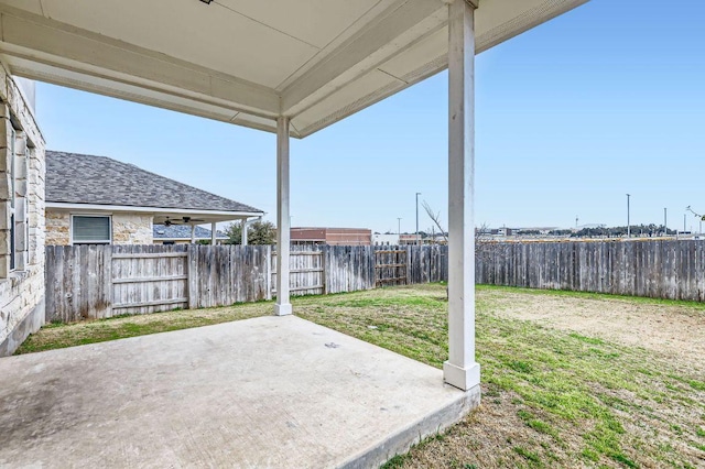 view of yard featuring a patio area and a fenced backyard