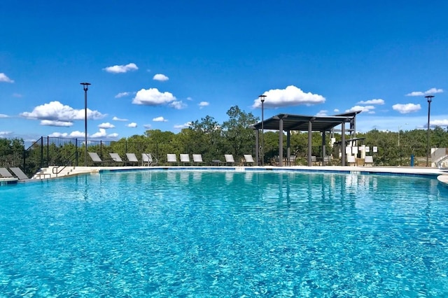 pool featuring fence