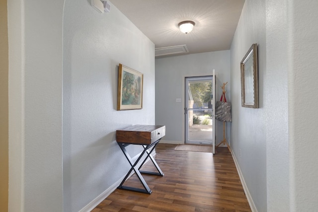 2000 Amur Dr, Austin, TX 78745 - hallway with dark wood finished floors and attic access