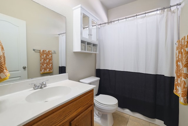 2000 Amur Dr, Austin, TX 78745 - full bath featuring vanity, tile patterned floors, and a shower with curtain