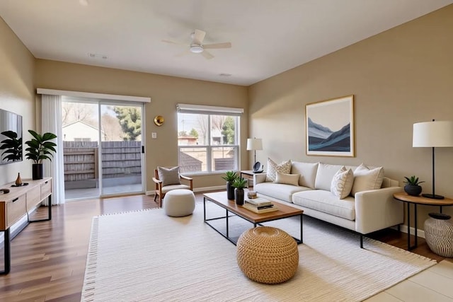 2000 Amur Dr, Austin, TX 78745 - living area featuring a ceiling fan and wood finished floors