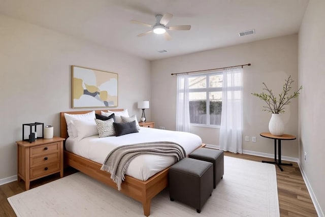 2000 Amur Dr, Austin, TX 78745 - bedroom with wood finished floors and ceiling fan