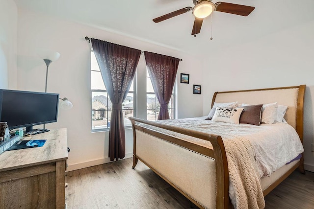 2141 Dragon Trl, New Braunfels, TX 78130 - bedroom featuring wood finished floors and ceiling fan