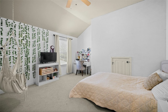 bedroom featuring a ceiling fan, carpet, and vaulted ceiling