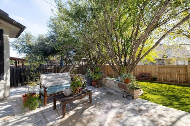 view of patio featuring a fenced backyard