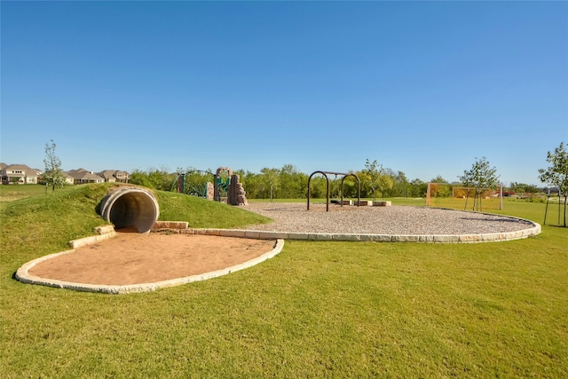 community play area featuring a yard