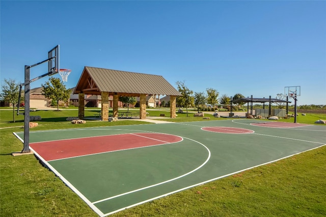 view of basketball court featuring a yard, a gazebo, and community basketball court