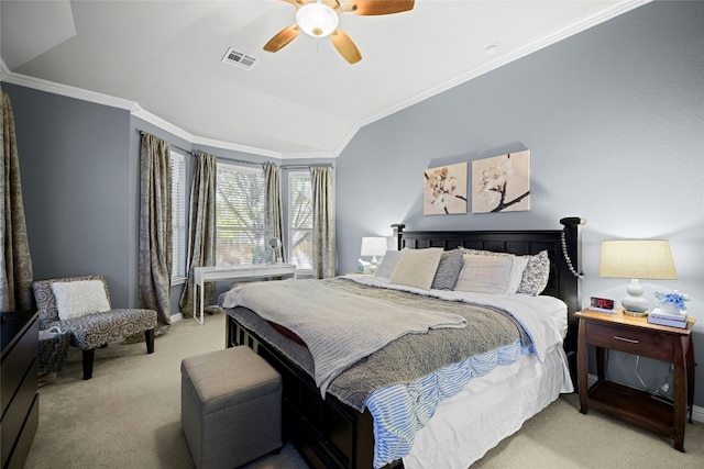 bedroom featuring carpet floors, crown molding, lofted ceiling, visible vents, and a ceiling fan