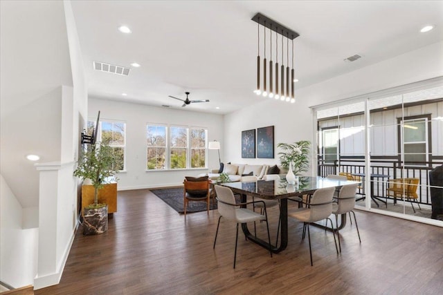 dining area with baseboards, visible vents, dark wood-style flooring, and recessed lighting