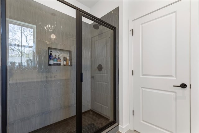 full bathroom featuring a shower stall