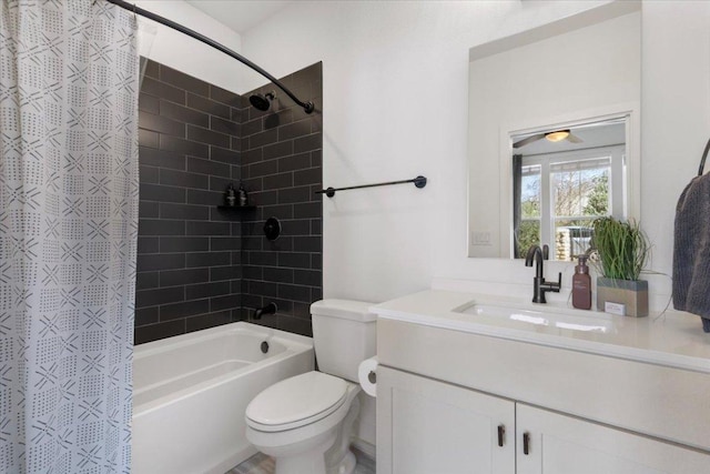 bathroom featuring shower / tub combo with curtain, vanity, and toilet