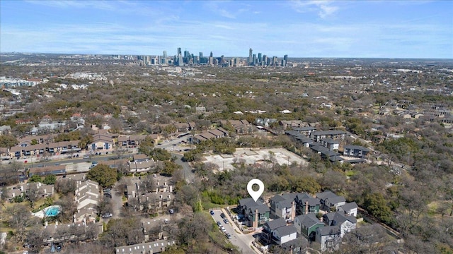 birds eye view of property with a residential view