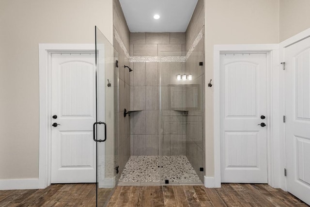 13525 Queen Johanna Ct, Corpus Christi, TX 78418 - bathroom with a shower stall, wood finished floors, and recessed lighting