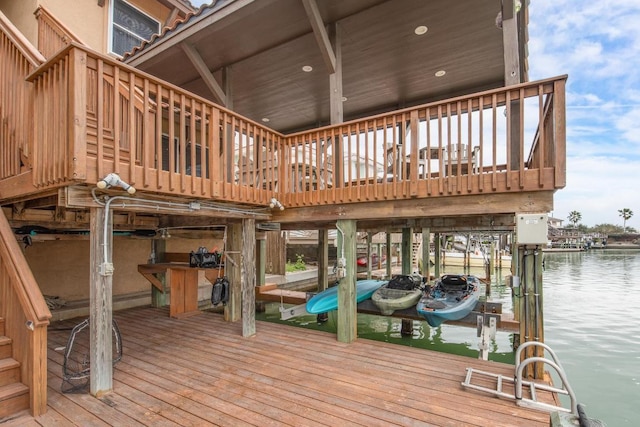 dock area featuring a water view and boat lift