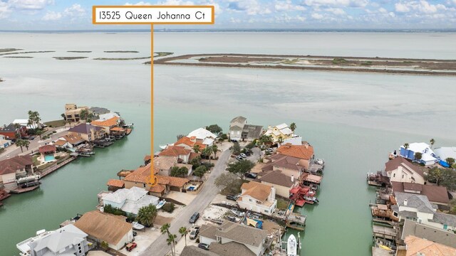 13525 Queen Johanna Ct, Corpus Christi, TX 78418 - aerial perspective of suburban area featuring a large body of water