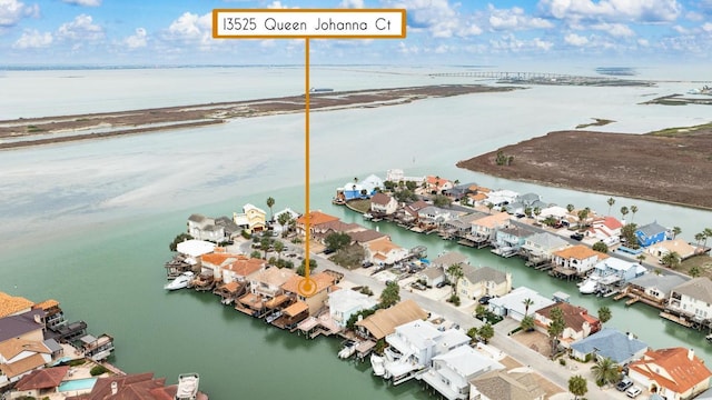 aerial view featuring a residential view and a water view