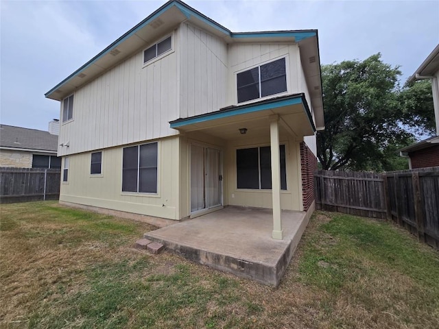 4533 Corran Ferry Loop, Austin, TX 78749 - back of house with a patio and a fenced backyard