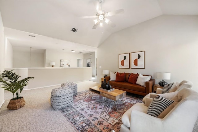 carpeted living room featuring lofted ceiling, visible vents, and a ceiling fan